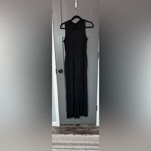 Elegant Black Sleeveless Wide Leg Jumper with Pockets.